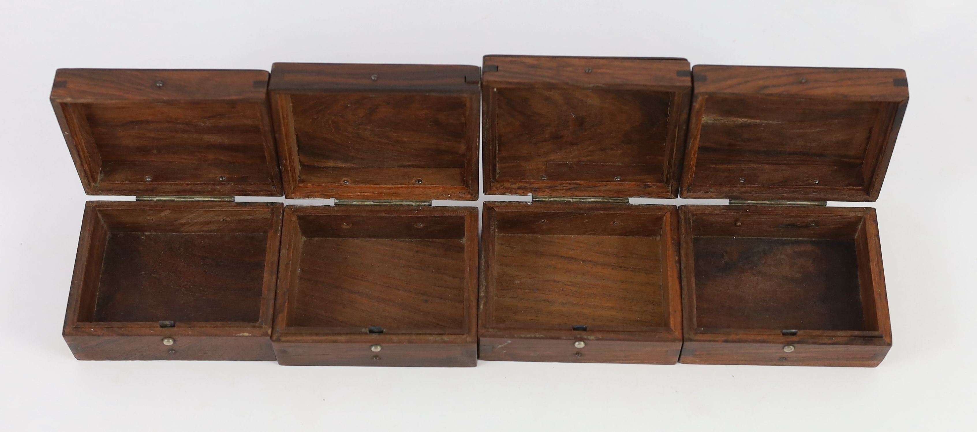 A set of four Chinese huanghuali games boxes and covers, 19th century, each 8.4cm wide